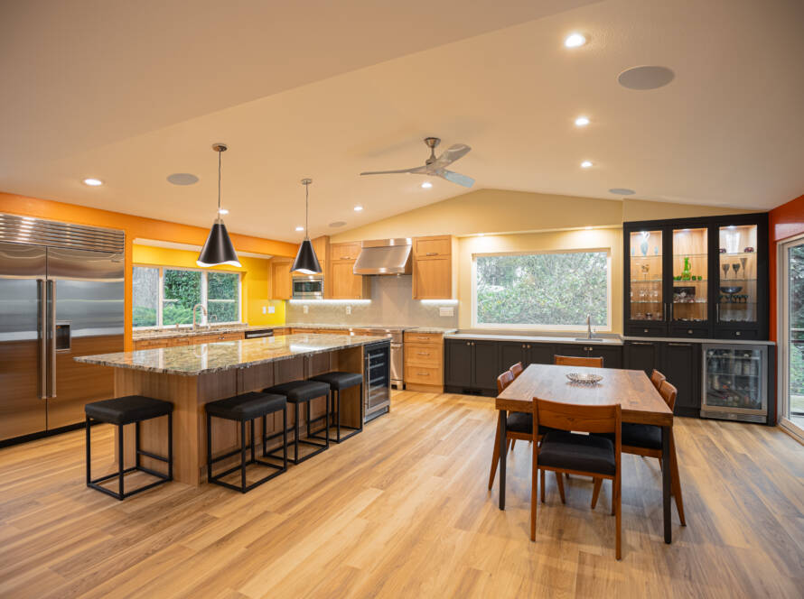 Spacious modern kitchen in Issaquah with custom white cabinets, updated layout, and natural lighting